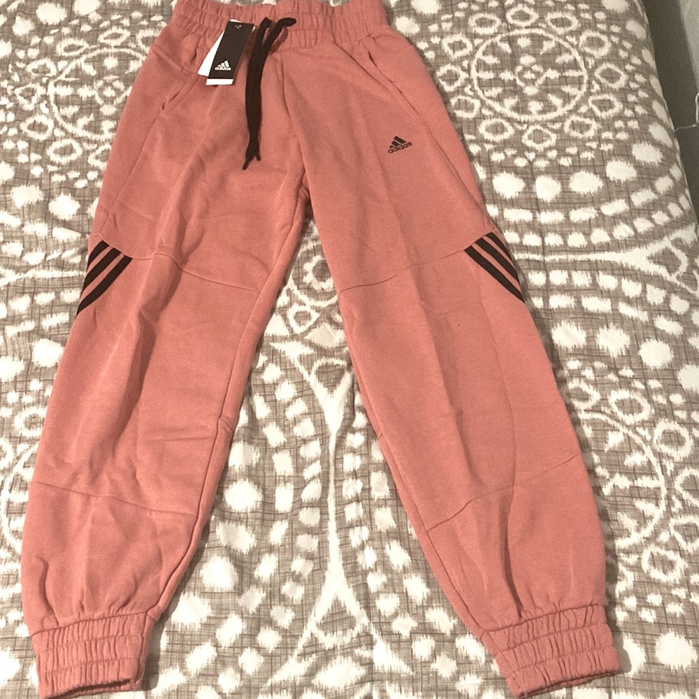 Brand new Adidas sweat pants.New as of today. It’s a size XS but fits like a SM.